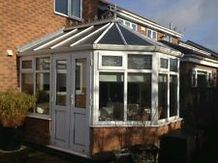 Victorian Conservatory new roof panels and double doors replaced.
